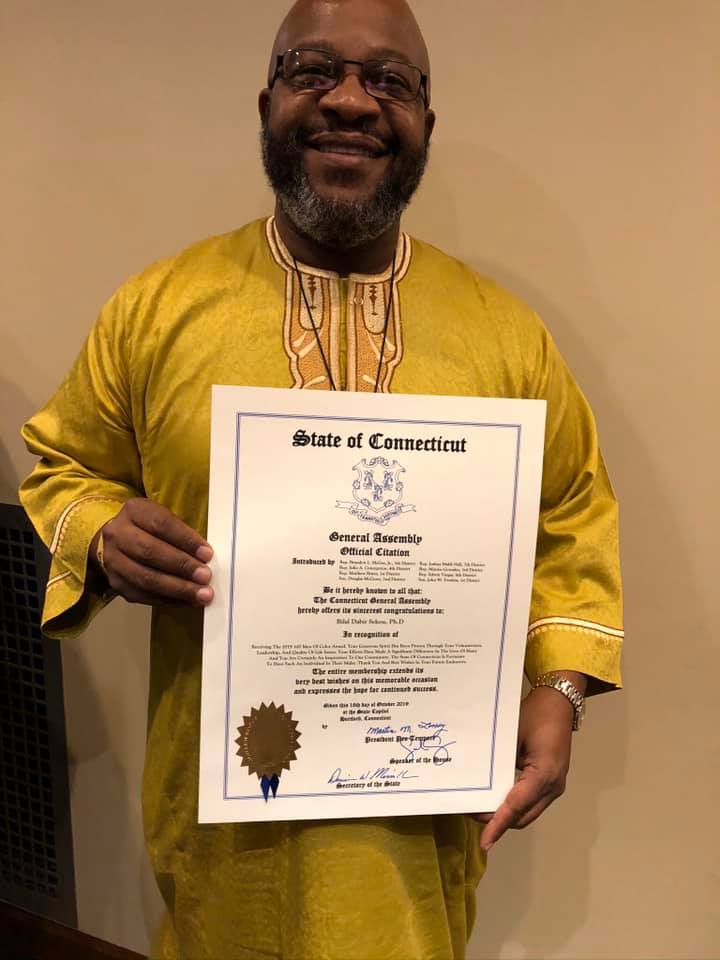 Hillyer College Associate Professor Bilal Sekou received a proclamation from the State of Connecticut at the 100 Men of Color Gala and Awards.